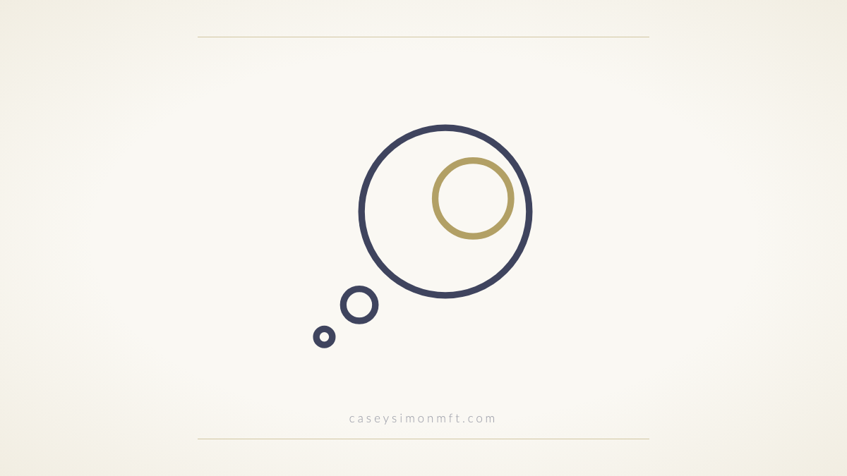 Outline of a large thought bubble holding a smaller gold circle